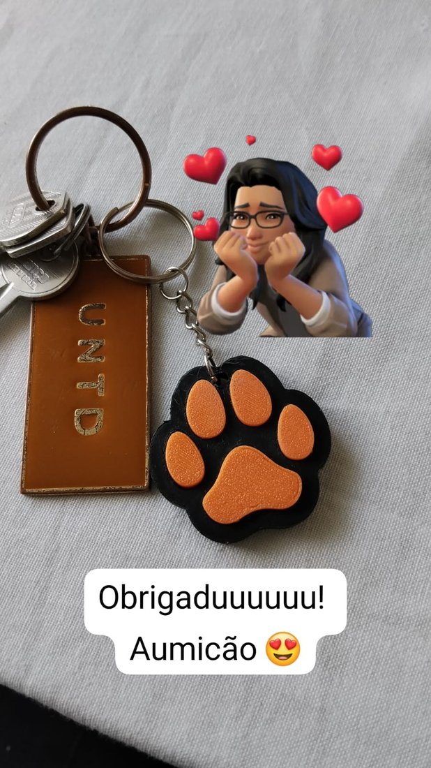 Chaveiro de patinha dado de presente para tutora cliente